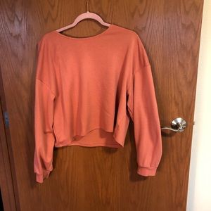 Pink divided crop sweatshirt